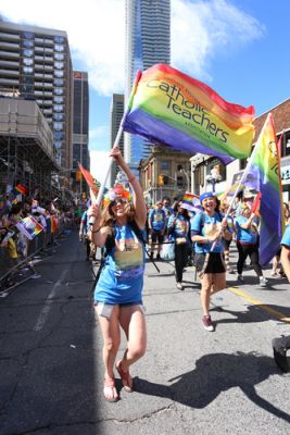 Catholic teachers marching in a Pride parade