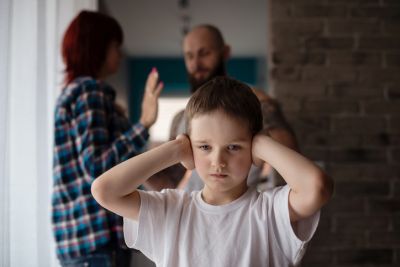 Child Listening to Parents Fighting