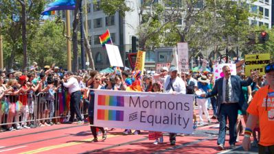 Mormon parade walkers marching for equality