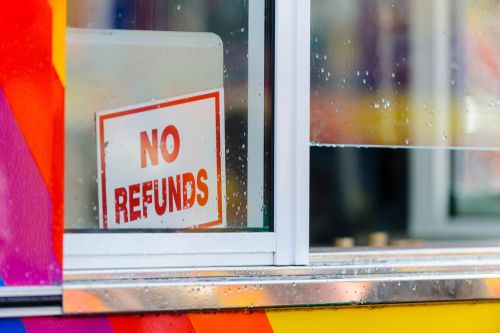 No Refunds Sign in Shop Window