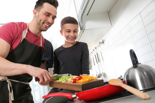 Parent and Teen Cooking Together