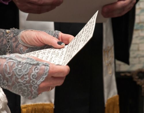 Bride Reading Handwritten Wedding Vows