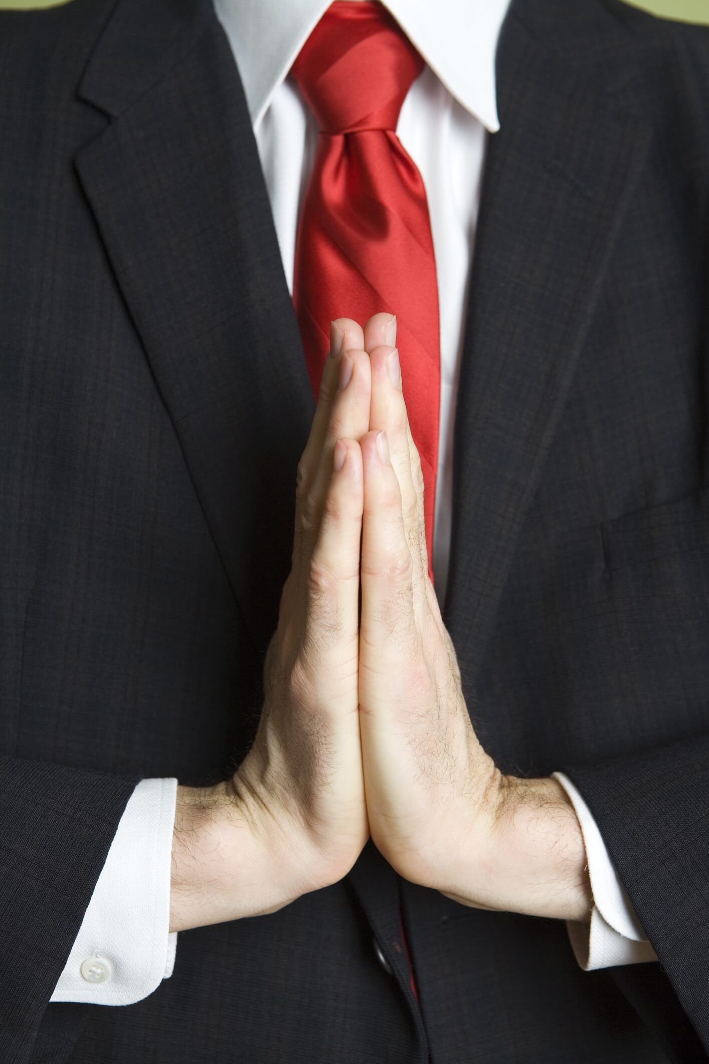 A man praying at work. 