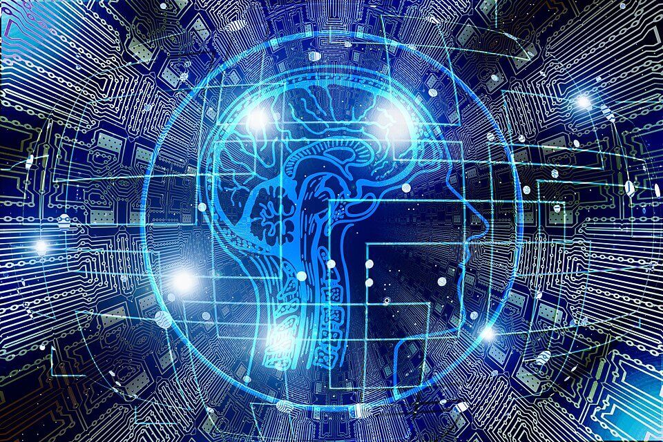 Digital illustration of a human head and brain overlaid with circuitry representing artificial intelligence