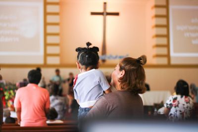 Children with parents attending church