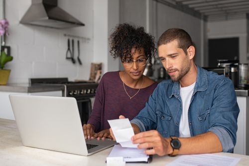 Couple Looking at Financial Docs