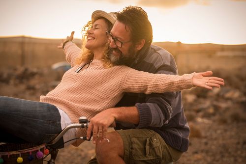 Couple Riding a Bike Together