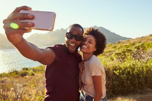 Couple Taking a Selfie With Their Time Off