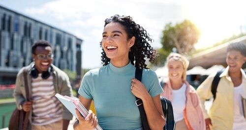 A group of young people walking together.