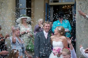 A young couple celebrates completion of the perfect ceremony