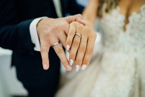 Groom and Bride After Exchanging Wedding Rings