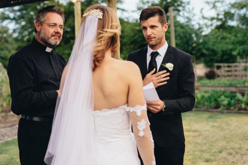 Groom, Bride and Wedding Officiant