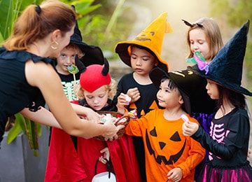 Group of kids trick or treating