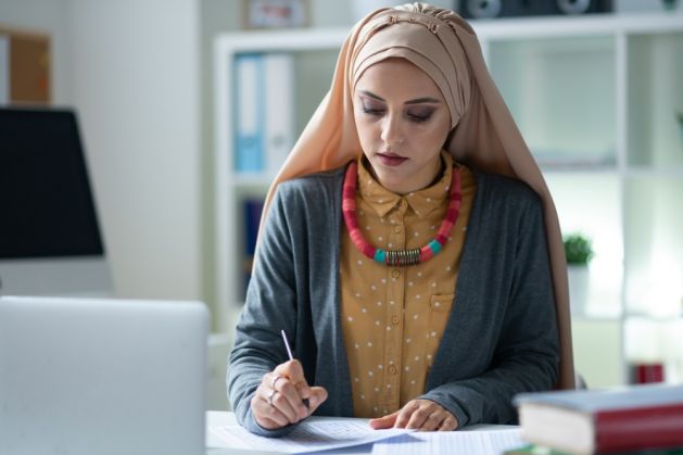 A female teacher wearing a hijab