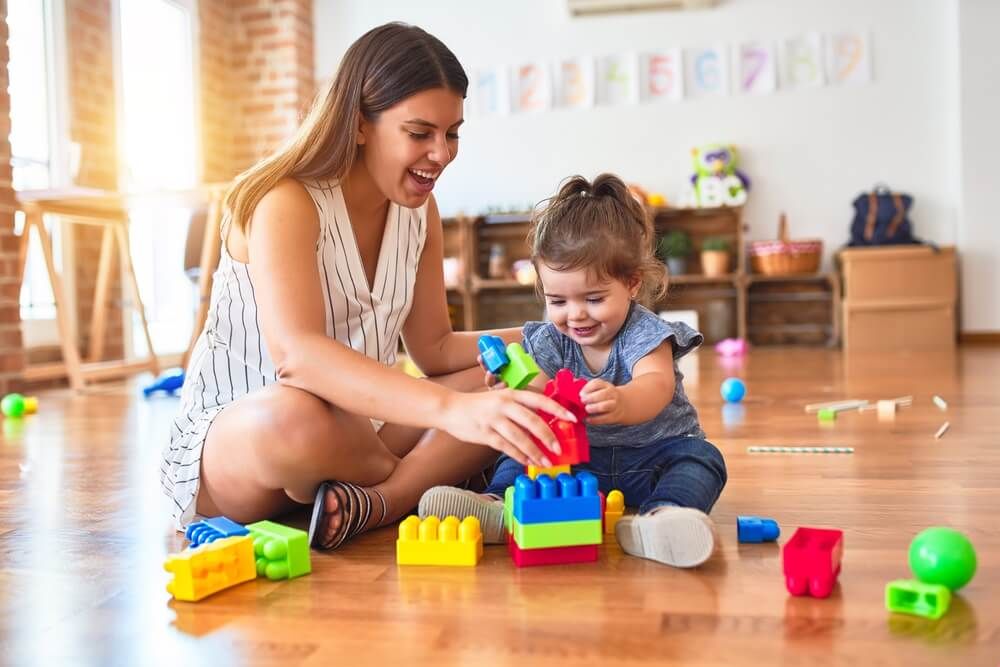 A mother plays with her child