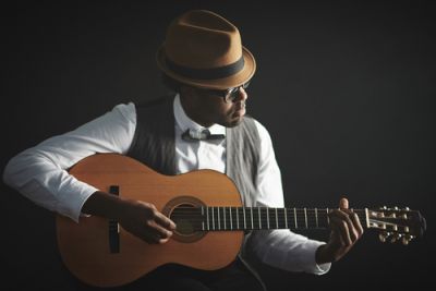 Man Playing the Guitar