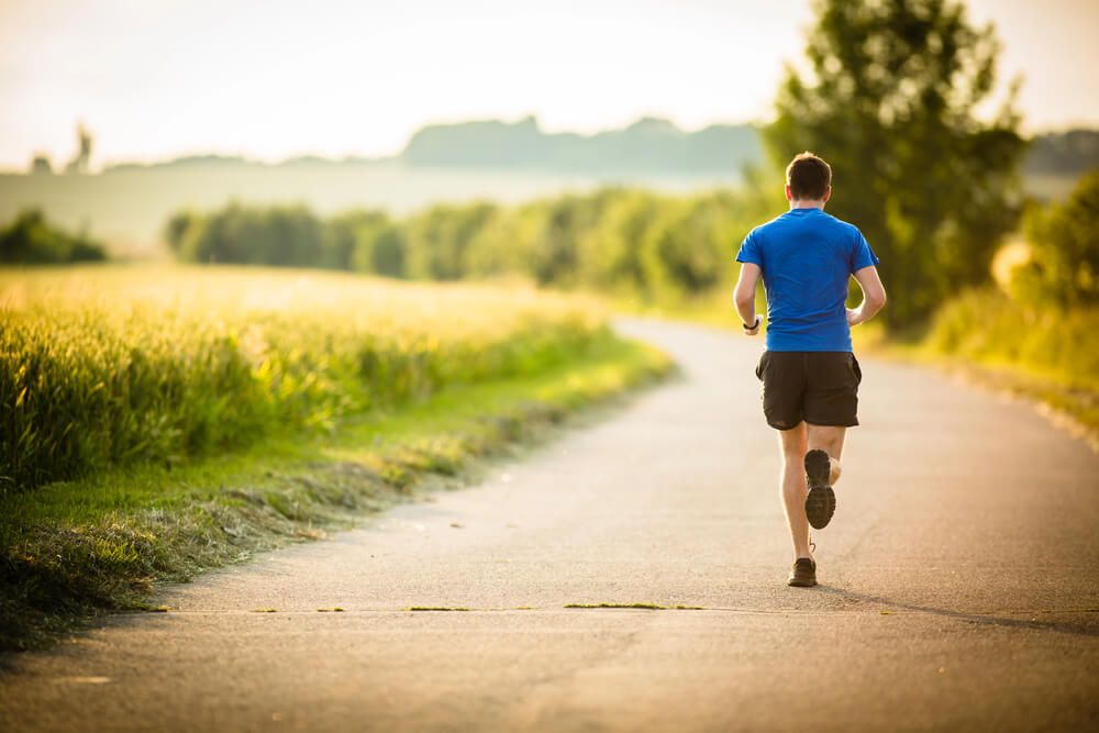 Man running through the country.
