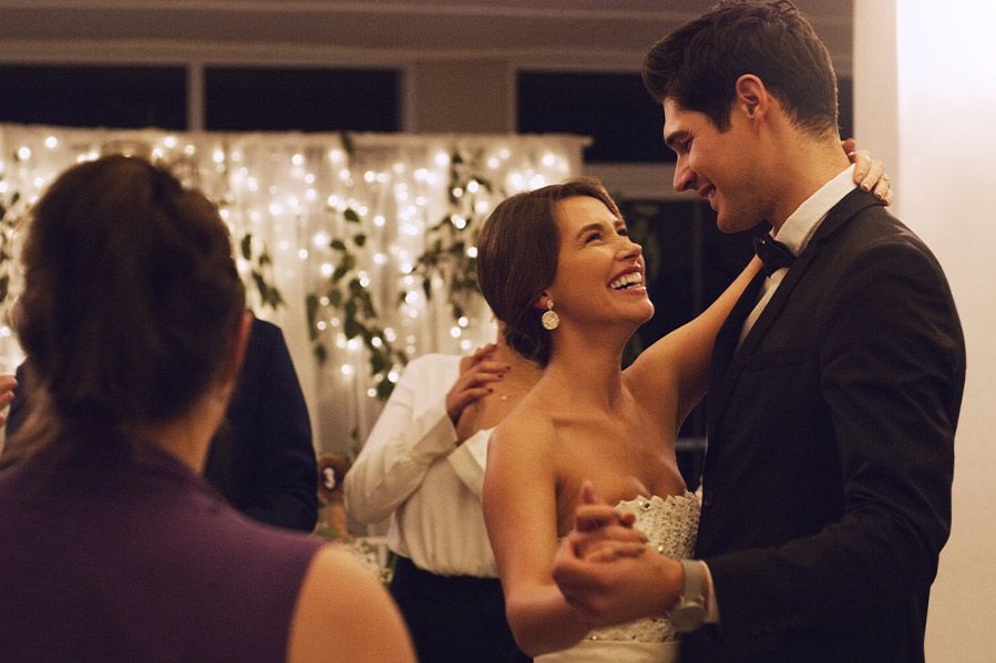 a couple slow dancing at their Micro wedding.