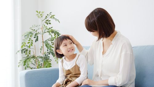 Daughter Receiving Praise From Mother