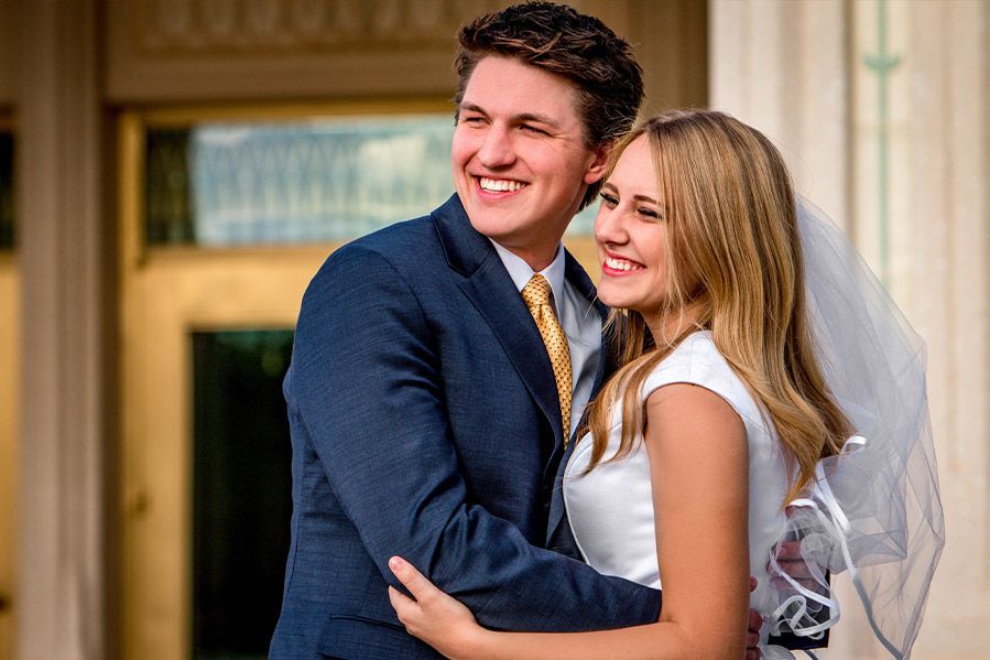 mormon couple embracing on wedding day