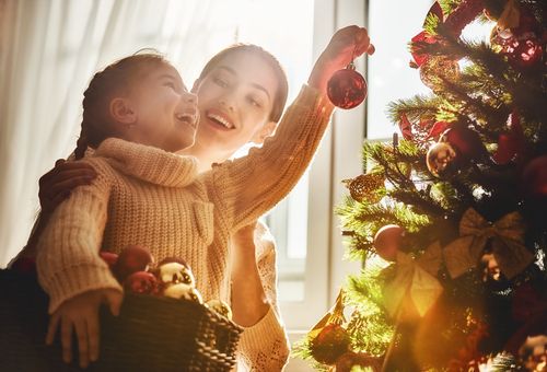 Mother and Daughter Decorating the Tree