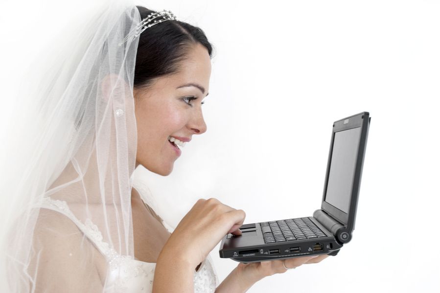 A bride using a laptop