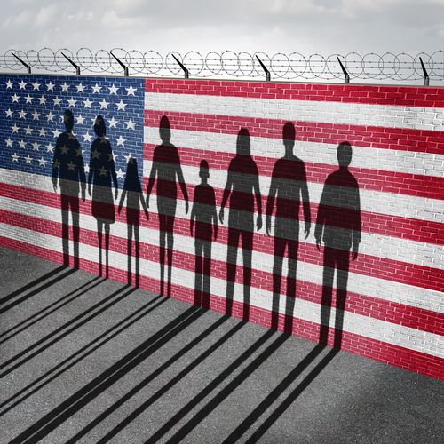 Refugees in Front of American Flag