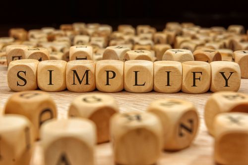 Simplify spelled out with wood blocks