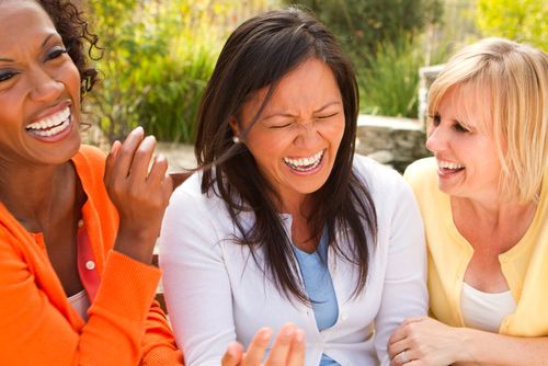 Three Friends Laughing Together