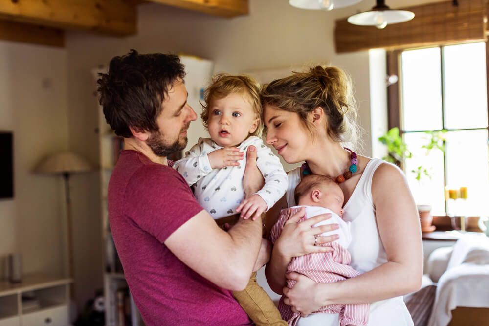 Young parents with their children.