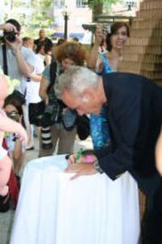 Tony Adams signing a marriage license at Pop Up Chapel