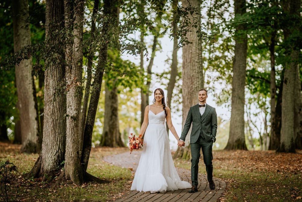 Outdoor weddings tend to be more casual when deciding what to wear to officiate a wedding.