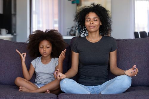 Woman and Child Practicing Mindfulness bMeditating