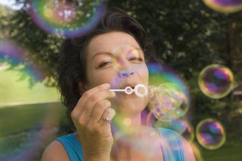 Woman Blowing Bubbles