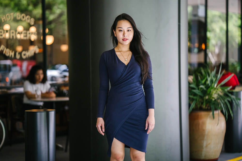 Dark dresses work well for officiating a winter wedding.