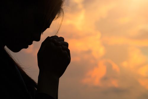 Woman in Prayer