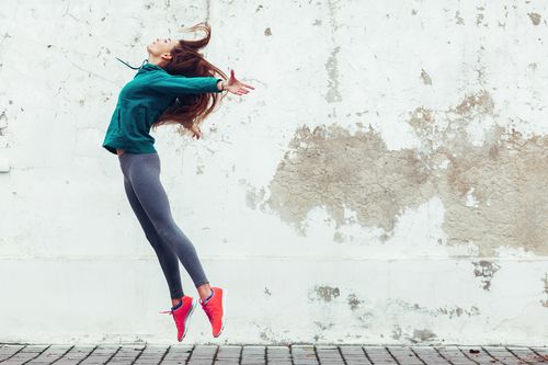 Woman Jumping With Joy