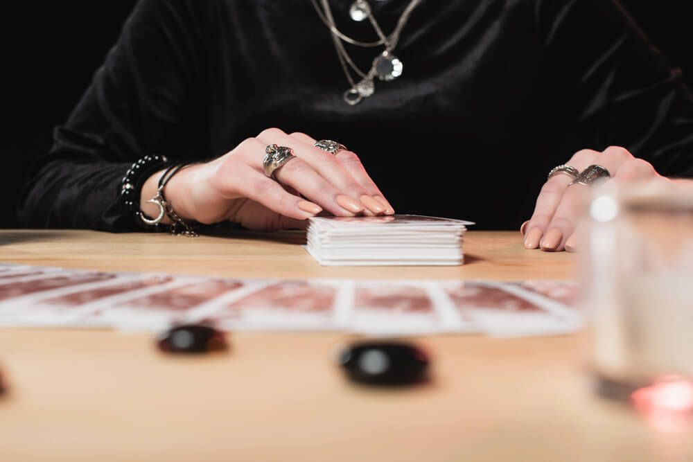 A woman using tarot cards.