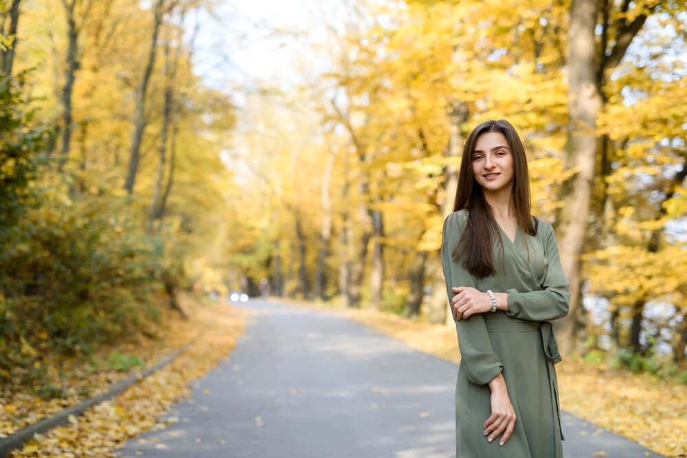 Woman posing with fall colors