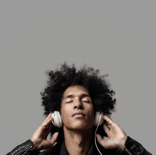 Young Man Listening to Music