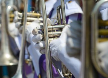 Band Plays Religious Song During Games