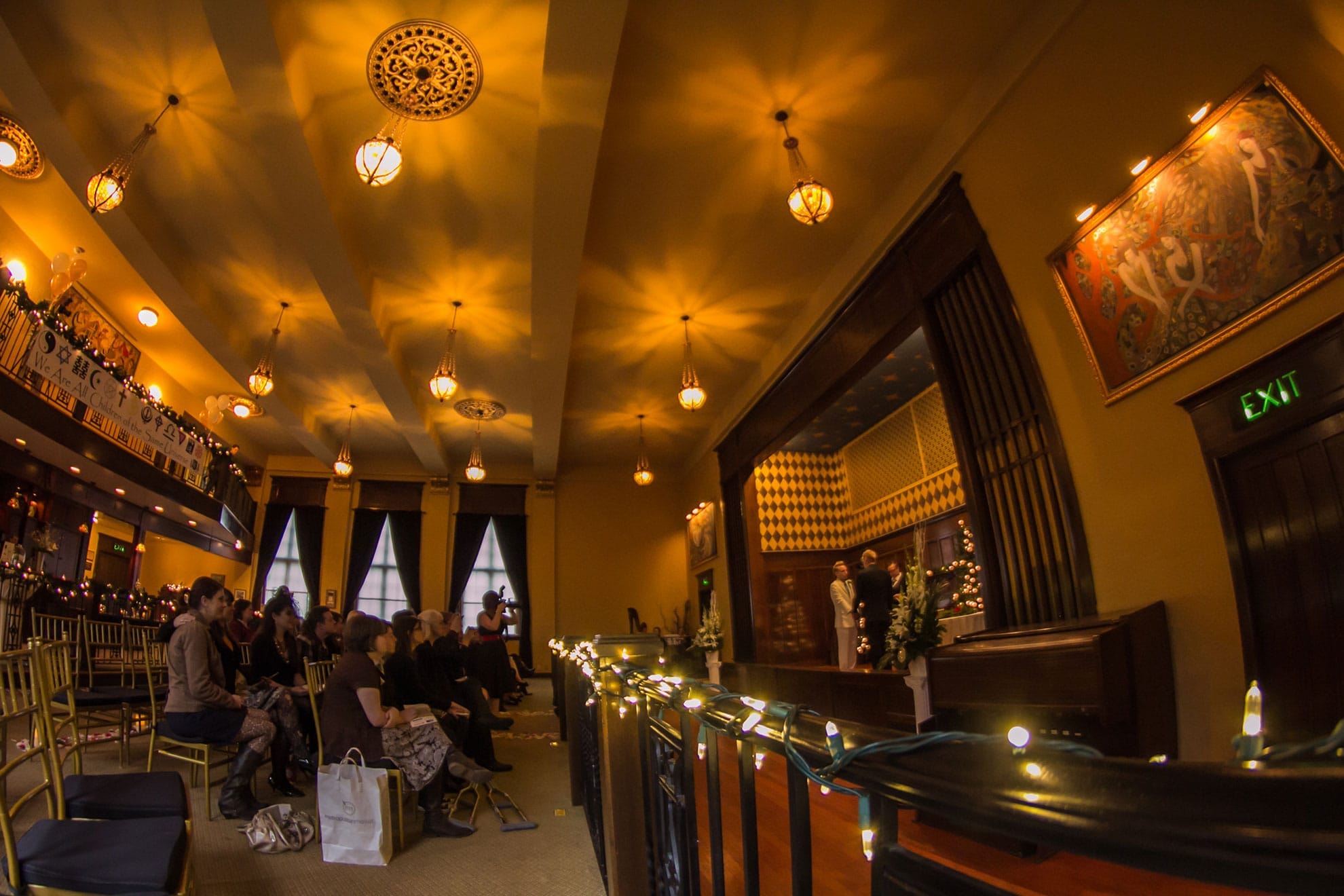 Minister giving speech with lights shining on him
