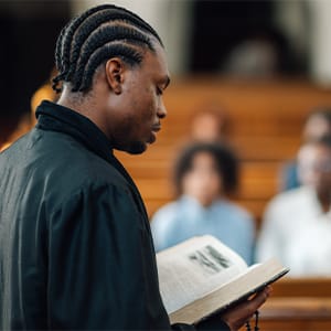 A pastor providing a sermon in church