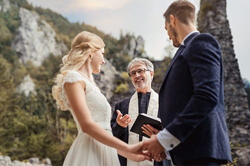 A couple getting married outside