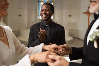 Wedding celebrant in church performing wedding for elderly couple